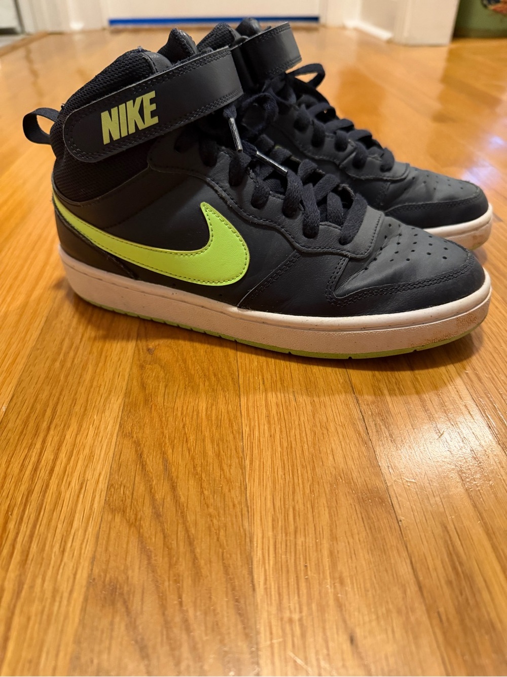 Nike Black High-Top Sneakers with Volt Swoosh Accent